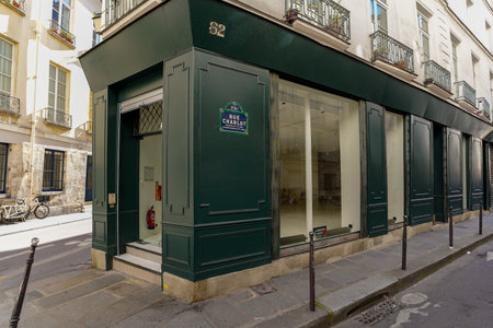 Green shop in the city center of paris, france. Vintage storefront ,typical french boutique facadeのeditorial素材