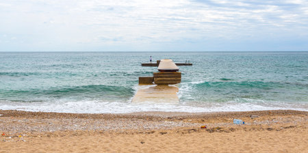 Pier on the beach in the town ofbudva montenegroのeditorial素材