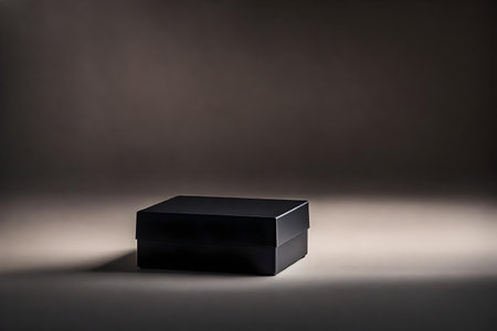 Black cosmetic box on a dark background. Beauty and health concept.の素材