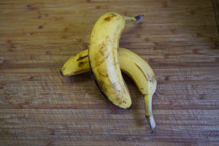 Banana on a wooden background. The concept of healthy eating.の写真素材