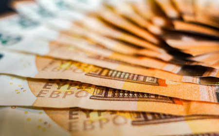 Euro banknotes as a background, close-up, selective focusの写真素材