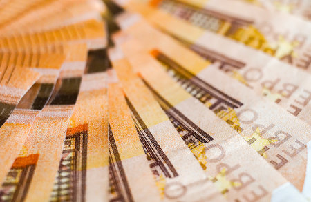 Euro banknotes in close-up macro shot with shallow depth of fieldの写真素材