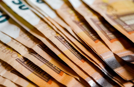 Euro banknotes as a background. Macro. Selective focus.の写真素材