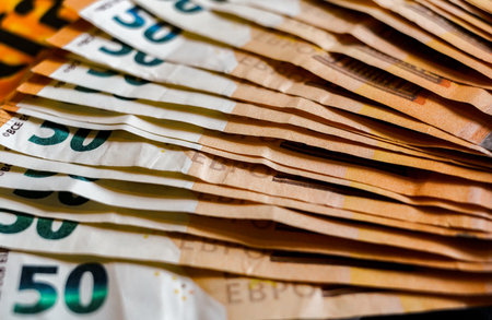 Euro banknotes as a background, close-up macro photo.の写真素材