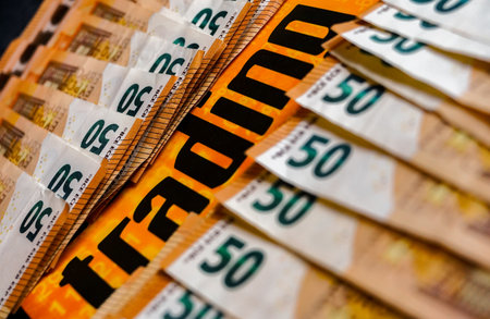 Euro banknotes in a row on a black background close-up