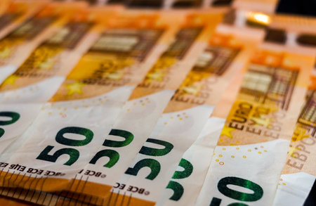 Euro banknotes in a row, close-up. Money backgroundの写真素材