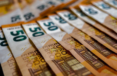 Euro banknotes in close-up macro photography. European currency.の写真素材