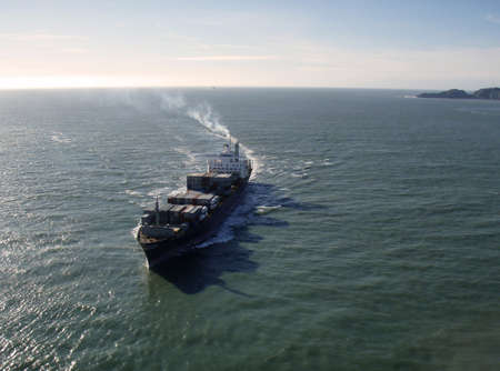 Cargo Boat Sails into San Francisco bay taken from the Golden Gate Bridgeの写真素材