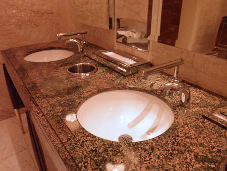 Portiat of stylistic bathroom Sinks in a fancy Las Vegas casinoの写真素材