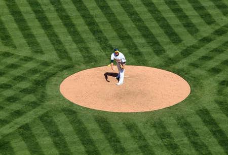 2010 AL Rookie of the Year Andrew Bailey, Oakland Athletics check for a signal from the catcher.  Oakland coliseum, California April 9, 2010のeditorial素材