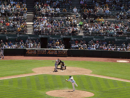 San Francisco Giants 0 Vs. Oakland Athletics 3: Athletics closer Andrew Bailey throws a pitch to Aubrey Huff who swings for contact.  Ball can be seen flying off the bat.  Taken May 23 2010 at the Coliseum Oakland California.のeditorial素材