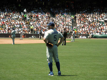 San Francisco Giants Vs. Los Angeles Dodgers: Dodgers Reed Johnson stands in right field with hands on hips between plays with indielders in view.  Taken June 30 2010 at ATT Park in San Francisco California.のeditorial素材