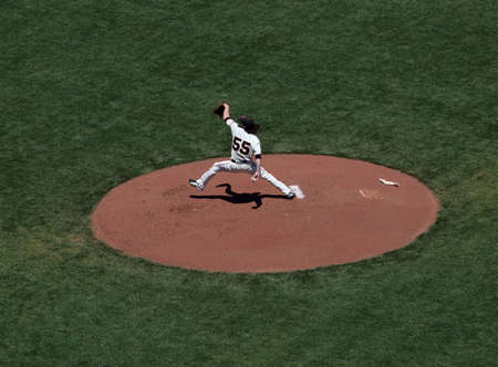 Giants Vs. Orioles: Giants two time Cy Young award winner Tim Lincecum in pitching motion during a day game.  June 16 2010 Att Park San Francisco Californiaのeditorial素材