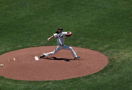 Giants Vs. Orioles: Giants two time Cy Young award winner Tim Lincecum in pitching motion during a day game.  June 16 2010 Att Park San Francisco Californiaのeditorial素材