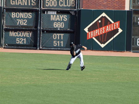 Giants Vs. Marlins: Marlins Cody Ross opens glove to catch fly ball in Center field Triples Alley...