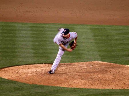 Red Sox vs. Athletics: Red Sox closer Jonathan Papelbon puffs his checks as throws a pitch.  Taken on July 19, 2010 at the Coliseum in Oakland California.のeditorial素材