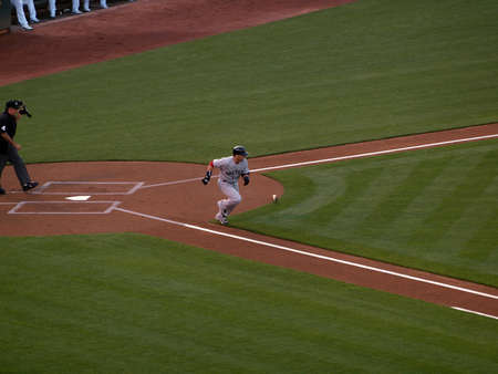 Red Sox vs. Athletics: Red Sox Marco Scutaro runs to first after hitting ball.  Taken on July 19,...