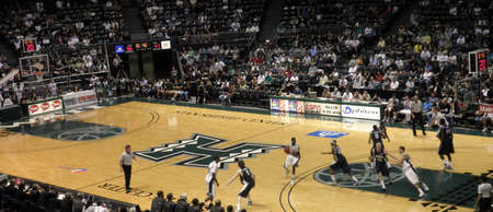 Nevada 63 vs. Hawaii 74: Hawaii Player looks to pass. 2/27/2010, Stan Sheriff Center, Honolulu, Hawaii.のeditorial素材