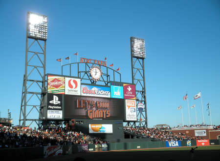 ATT Park HDTV Scoreboard in the outfield bleachers displays 'Let's Go Giants' in the final inning to rally the fans.  Taken July 28, 2010 San Francisco California.のeditorial素材