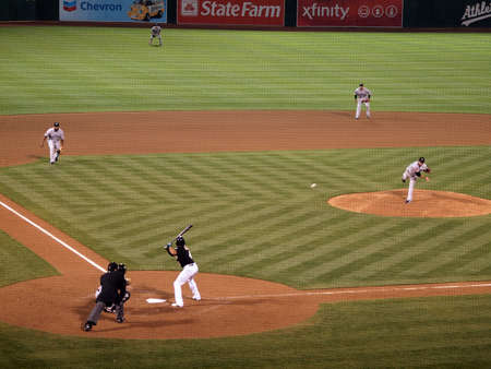 Blue Jays vs. Athletics: Blue Jays Pitcher Shaun Marcum throws pitch to Coco Crisp, ball can be seen leaving hand.  infield playing in.  Taken on August 16 2010 at Coliseum in Oakland California.のeditorial素材