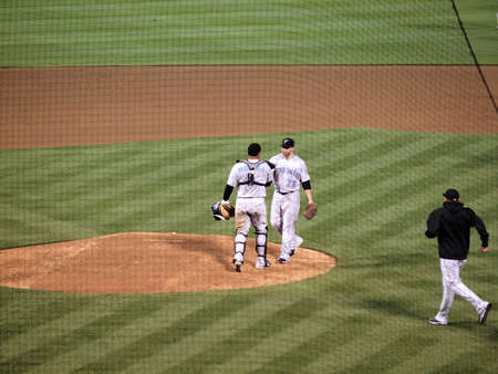 Blue Jays vs. Athletics: Blue Jays Pitcher Shaun Marcum shakes hand with catcher Jose Molina after winning a complete game.  Taken on August 16 2010 at Coliseum in Oakland California.のeditorial素材