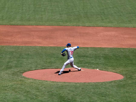 Giants Vs. Cubs: Cubs Randy Wells steps forward on mound to throws pitch.  August 12  2010 Att Park San Francisco Californiaのeditorial素材
