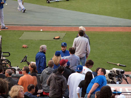 Dodger vs. Giants: Manager Joe Torre talks with people before the start of game.    July 30, 2010 Att Park in San Francisco CA.のeditorial素材