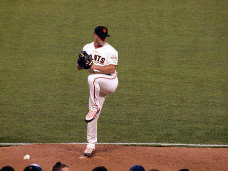 Giants Vs. Padres: Giants Closer Brian Wilson lifts his leg to throw as he warms up in the bullpen...