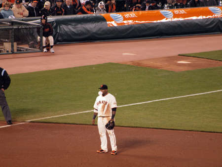 Giants Vs. Padres: 3rd Baseman Pablo Sandoval (Kung Fu Panda) blowing bubbles as he waits in between plays.  Taken May 12 2010 at Att Park San Francisco Californiaのeditorial素材