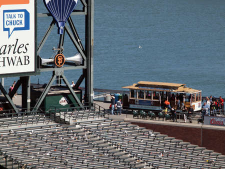 Giants Vs. Cubs: Seagulls roam the bleachers for food after the ending of a baseball game as fans slow leave ball park.  August 12  2010 Att Park San Francisco Californiaのeditorial素材