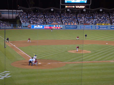 Dodgers vs. Astros: Dodger Jamey Carroll waits for throw from Astros pitcher Brian Moehler. Taken at Dodger Stadium Los Angeles, California May 18, 2010.  のeditorial素材