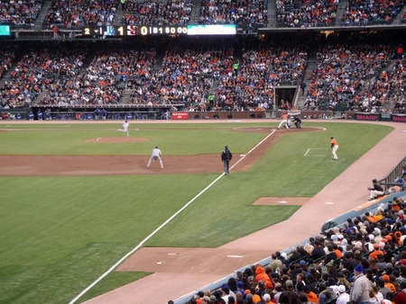 Dodger vs. Giants: Dodger pitcher Carlos Monasterios throws pitch to Giants player Buster Posey.  Taken from the 3rdbase line on July 30, 2010 Att Park in San Franciscoのeditorial素材
