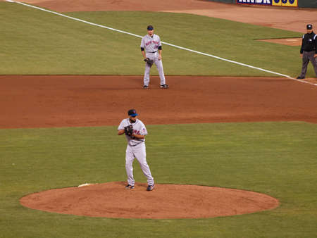 New York Mets vs. San Francisco Giants:  Mets Francisco Rodriguez stands on the mound with 1st baseman Ike Davis standing by 1st behind him. Taken July 17 2010 at the ATT Park San Francisco.のeditorial素材