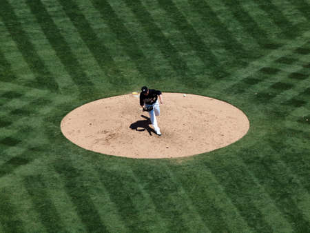 Royals vs. Athletics: Athletics Brett Anderson throws fastball with ball in air.  Taken on August 4 2010 at Coliseum in Oakland California.のeditorial素材