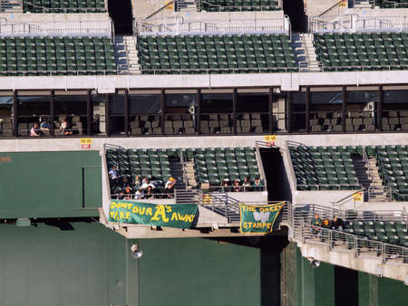 Blue Jays vs. Athletics: Oakland Athletics fans hang sign protesting owners desire to move the team out of Oakland in the outfield bleachers. Taken on August 16 2010 at Coliseum in Oakland California.のeditorial素材