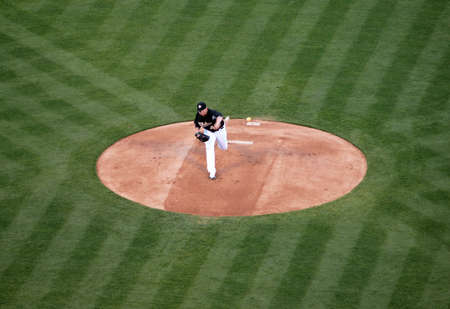 Blue Jays vs. Athletics: Athletics Brett Anderson throws pitch as ball leaves his hand .  Taken on August 16 2010 at Coliseum in Oakland California.のeditorial素材