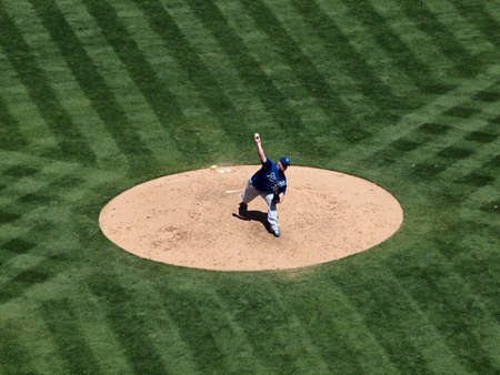 Royals vs. Athletics: Royals Sean O'Sullivan steps into a pitch throw with arm overhead.  Taken on August 4 2010 at Coliseum in Oakland California.のeditorial素材