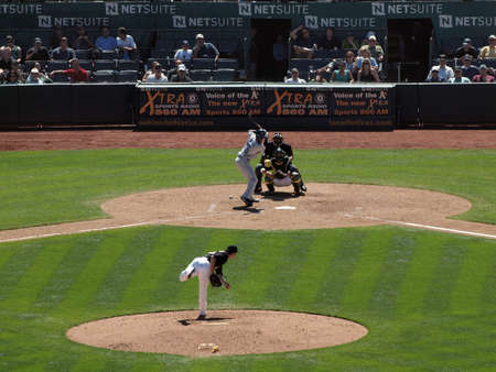 Blue Jays vs. Athletics: Athletics Jerry Blevins throws pitch to Blue Jays Fred Lewis with catcher Kurt Suzuki waiting for pitch.  Taken on August 18 2010 at Coliseum in Oakland California.のeditorial素材
