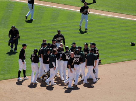 Blue Jays vs. Athletics: Athletics Celebrate win after pulling though in the last moments.  Taken on August 18 2010 at Coliseum in Oakland California.のeditorial素材