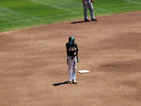 Blue Jays vs. Athletics: Dirty Athletic Coco Crisp takes a walking lead from second .  Taken on August 18 2010 at Coliseum in Oakland California.のeditorial素材