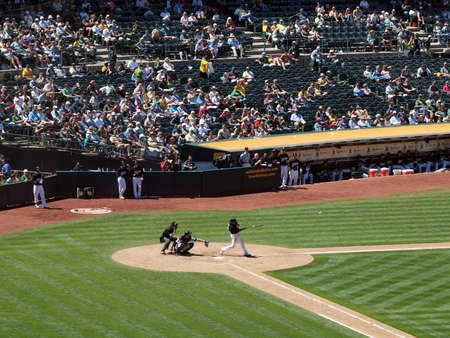 Blue Jays vs. Athletics: Athletics Coco Crisp hits homerun ball flies off his bat.  Taken on August 18 2010 at Coliseum in Oakland California.のeditorial素材