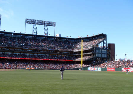 San Diego Padres Vs. San Francisco Giants: Padres Ryan Ludwick stands in right field between plays with rest of outfield visible.  Taken August 14 2010 at ATT Park in San Francisco California.のeditorial素材