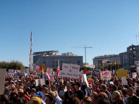 People hold sign in opposition to California's Prop. 8 which bans gay marriage in front of San Francisco City Hall.  Taken November 15, 2008 in San Francisco CA.のeditorial素材