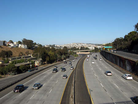 San Francisco Multi-leveled Highway with cars racing by on the 280.  Taken from a highway overpass in late afternoon traffic August 22 2010 Mission San Francisco CA.のeditorial素材