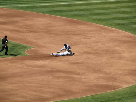 Red Sox vs. A's: Coco Crisp slides into 2nd during a steal as 2nd baseman place a tag moments to...