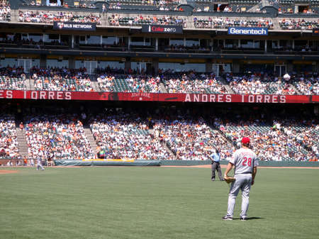 Reds vs. Giants: Reds Outfielder Chris Heisey stands in right field in between plays.  August 25 2010 at the ATT park San Francisco California.のeditorial素材