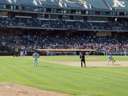 Red Sox vs. A's: Red Sox closer Jonathan Papelbon throws pitch to A's Daric Barton during last out of game.  September 12 2010 Coliseum Oakland Californiaのeditorial素材