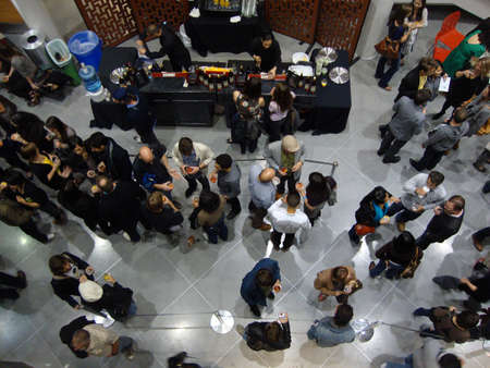 Opening Night of Techno-Craft: Long line at Bar during art opening at the yerba buena center for the arts.  Viewed from overhead Taken July 9 2010, San Francisco, CA.のeditorial素材