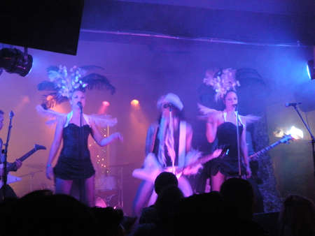 Triple Cobra female singing sisters sing chorus as band jams on stage.  April 1 2009 San Francisco CA.のeditorial素材