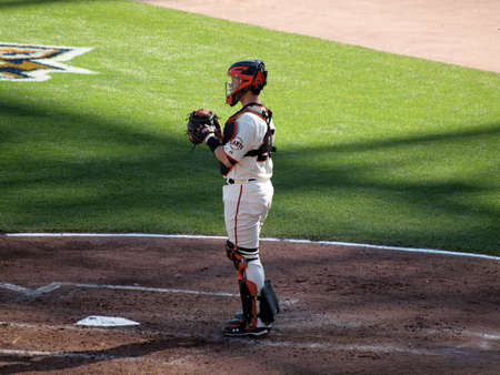 SAN FRANCISCO, CA - OCTOBER 19: San Francisco Giants vs. Philadelphia Phillies:Catcher Buster Posey stands in catcher gear in between innings game three of the NLCS 2010 taken October 19, 2010 AT&T Park San Francisco California. のeditorial素材